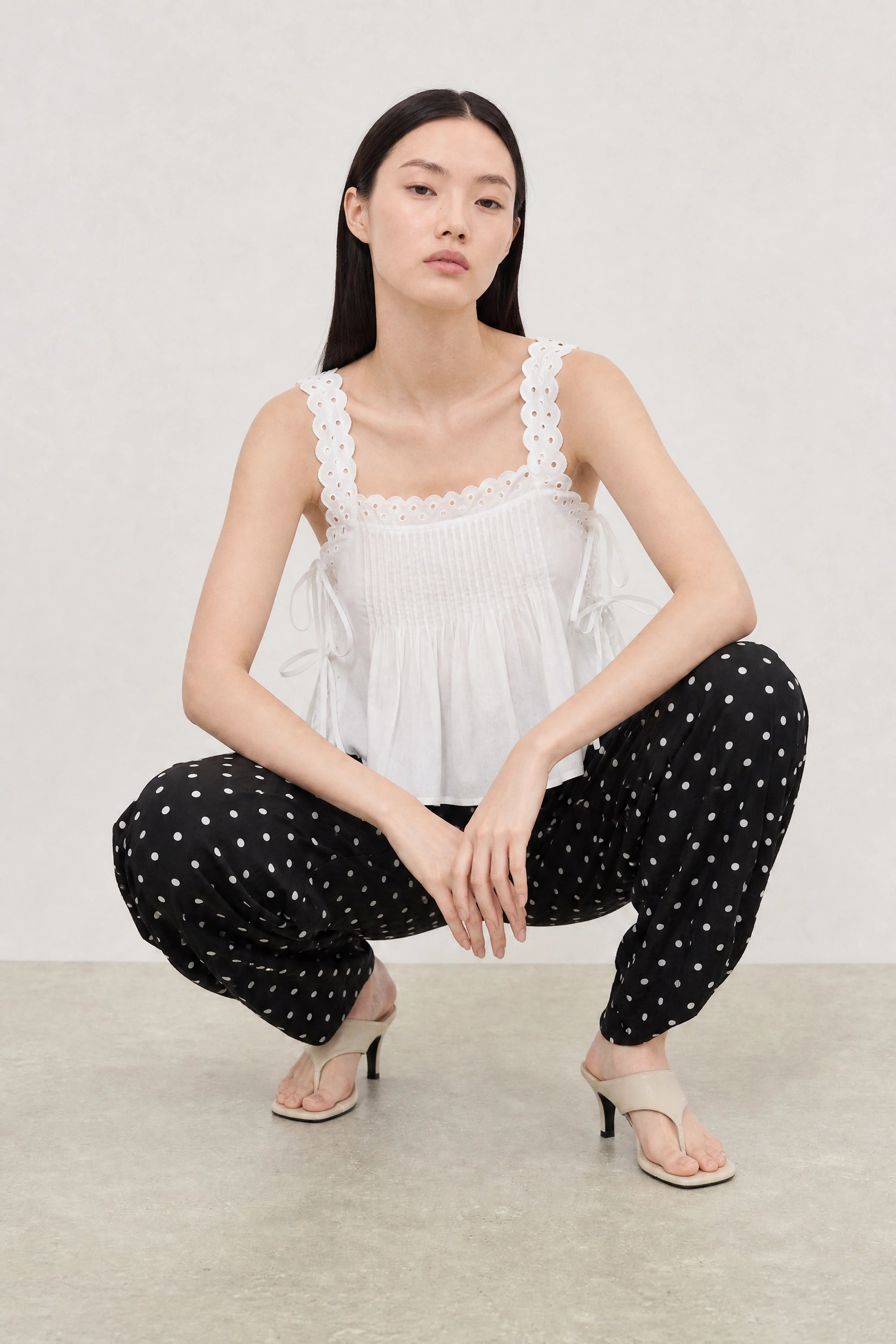 Black and white polka dot linen blend slouchy trousers_5