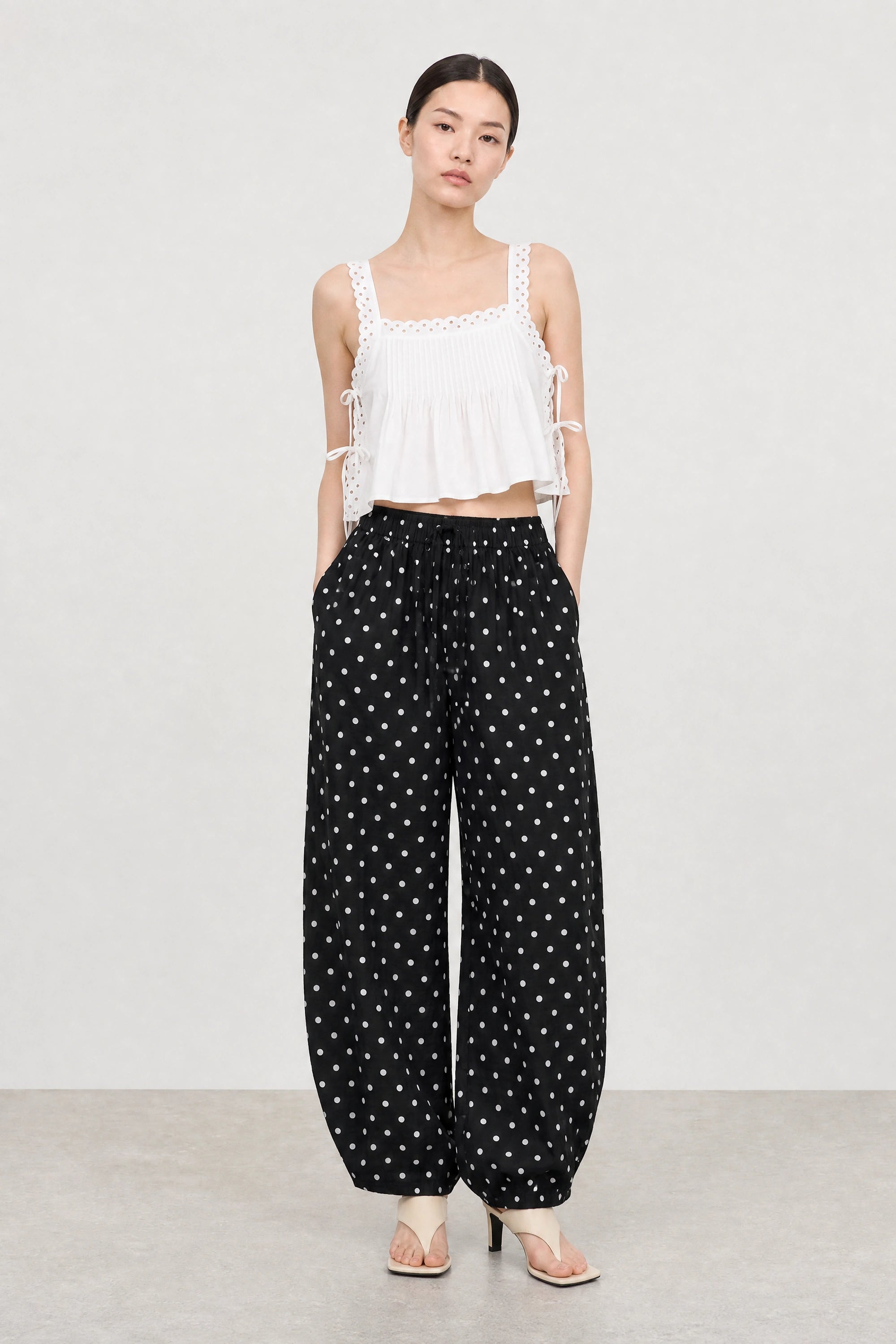 Black and white polka dot linen blend slouchy trousers_4