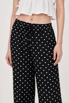 Black and white polka dot linen blend slouchy trousers_3