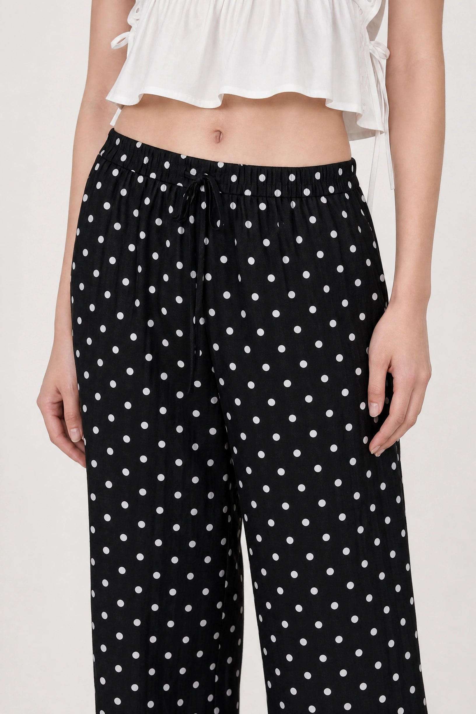 Black and white polka dot linen blend slouchy trousers_3