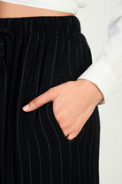 Black and white striped tie waist trousers_3