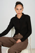 Black jersey sharp shoulder button front top_1