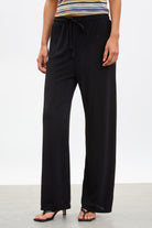 Black jersey slouchy wide leg trousers_1