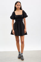 Black puff sleeve open back mini dress_1