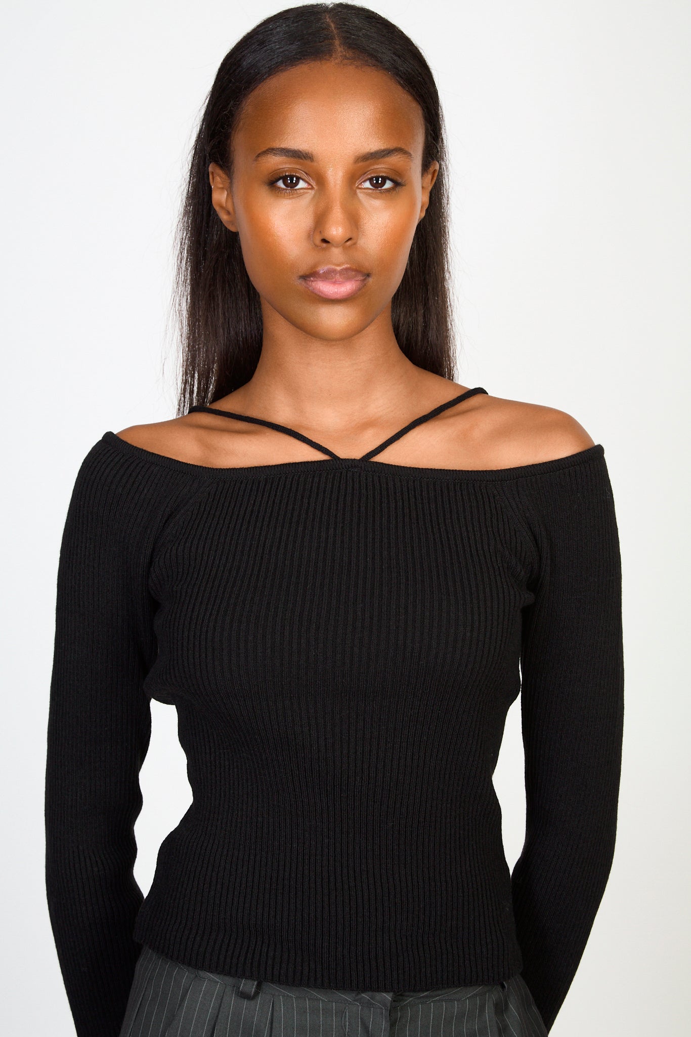 Black ribbed slim strap detail knit top