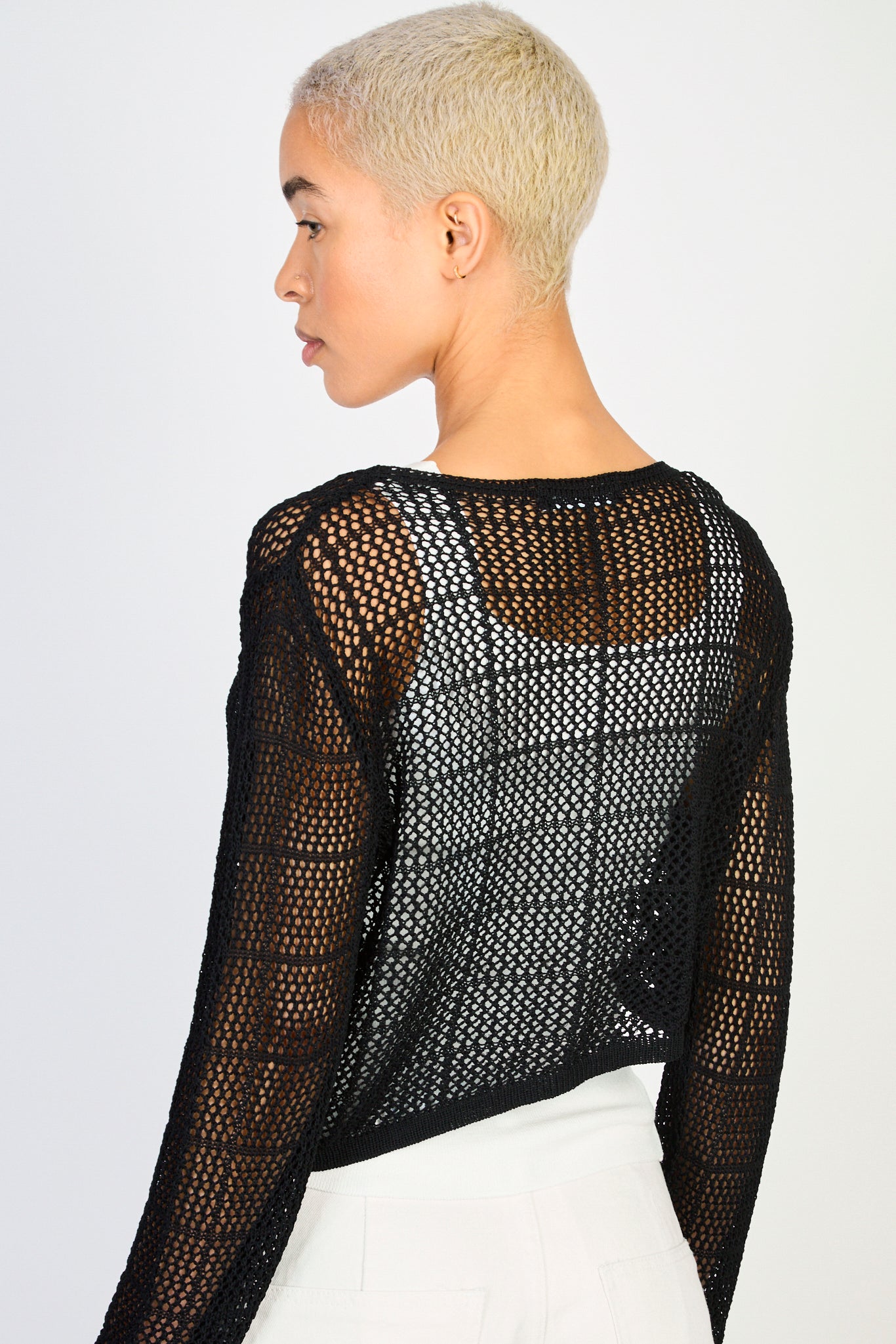 Black sheer knit asymmetric hem jumper | Glassworks London