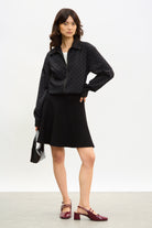 Black smooth shaped knit mini skirt_3