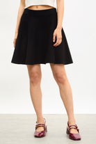 Black smooth shaped knit mini skirt_1