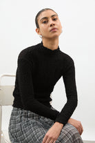 Black textured long sleeve mock neck top_5