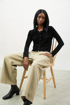 Black textured velvet ruffle trim long sleeve top_5