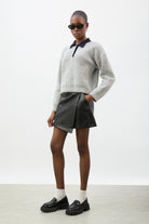 Black vegan leather asymmetric wrap mini skirt_3