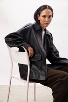 Black vegan leather long oversized jacket_7