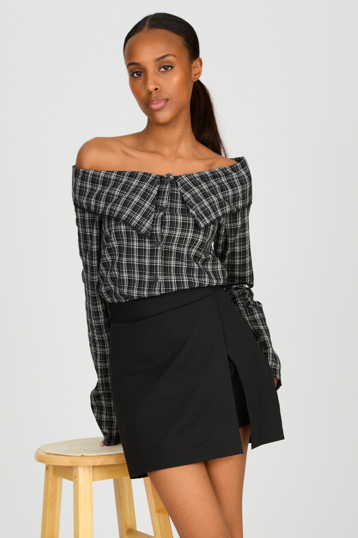 Black wrap mini skirt