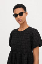 Black textured puff short sleeve tiered blouse_3