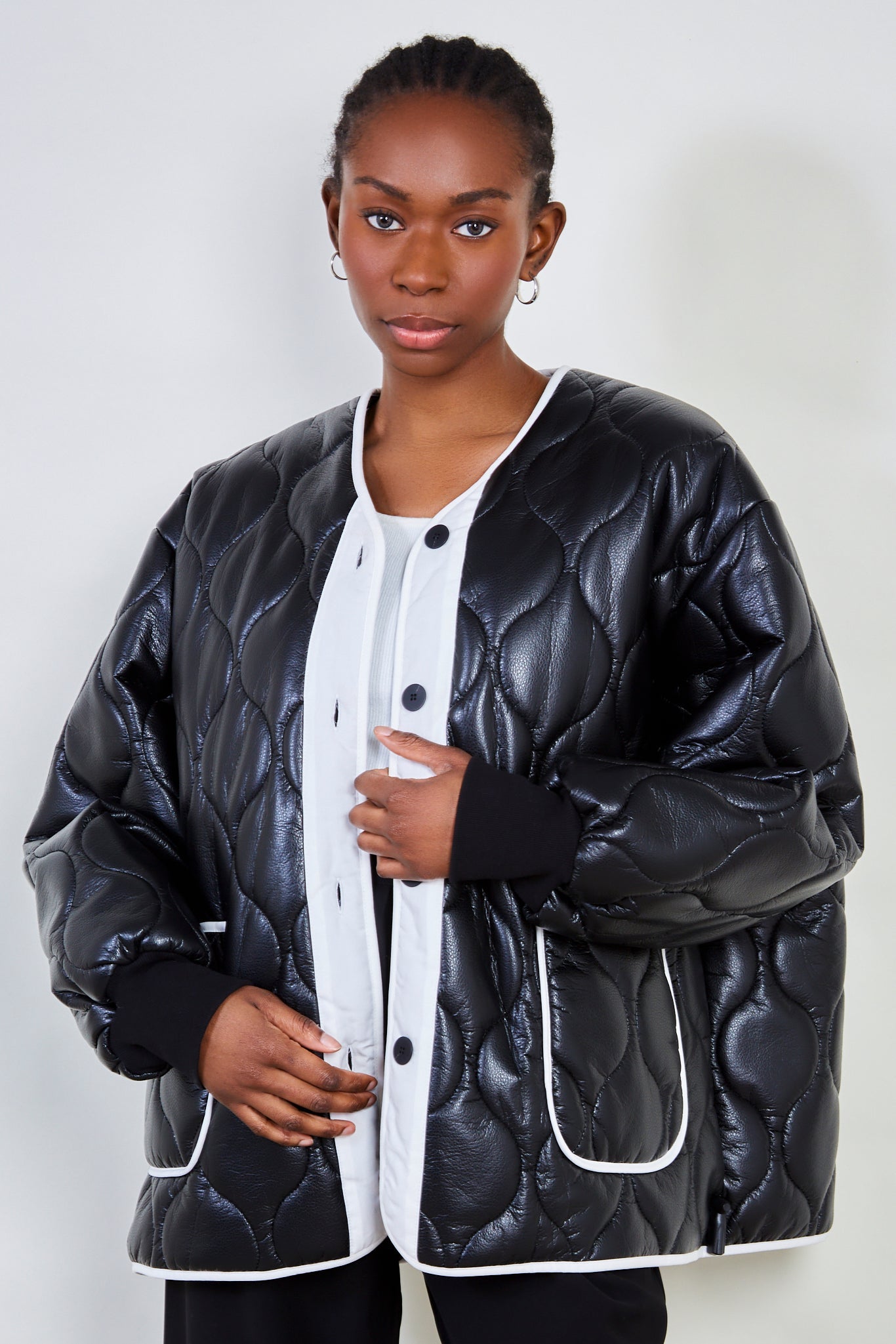 Black and white vegan leather wave stitch coat