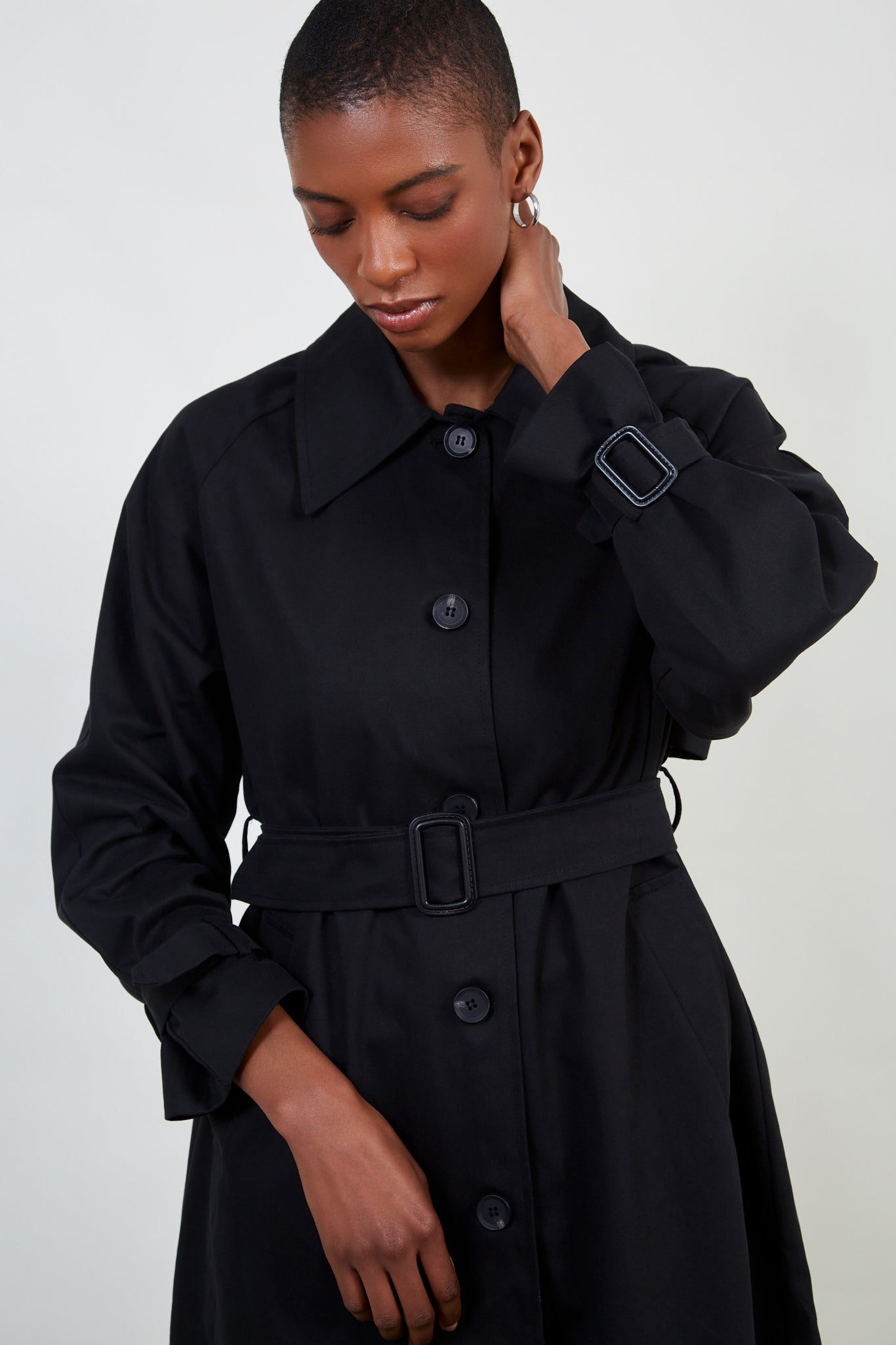 Black single breasted buckle detail trench coat