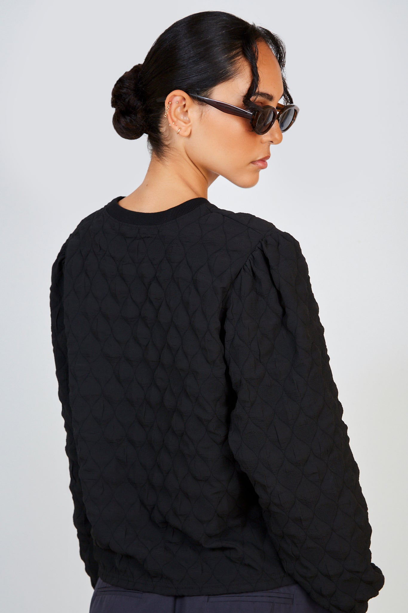 Black textured bubble long sleeved top