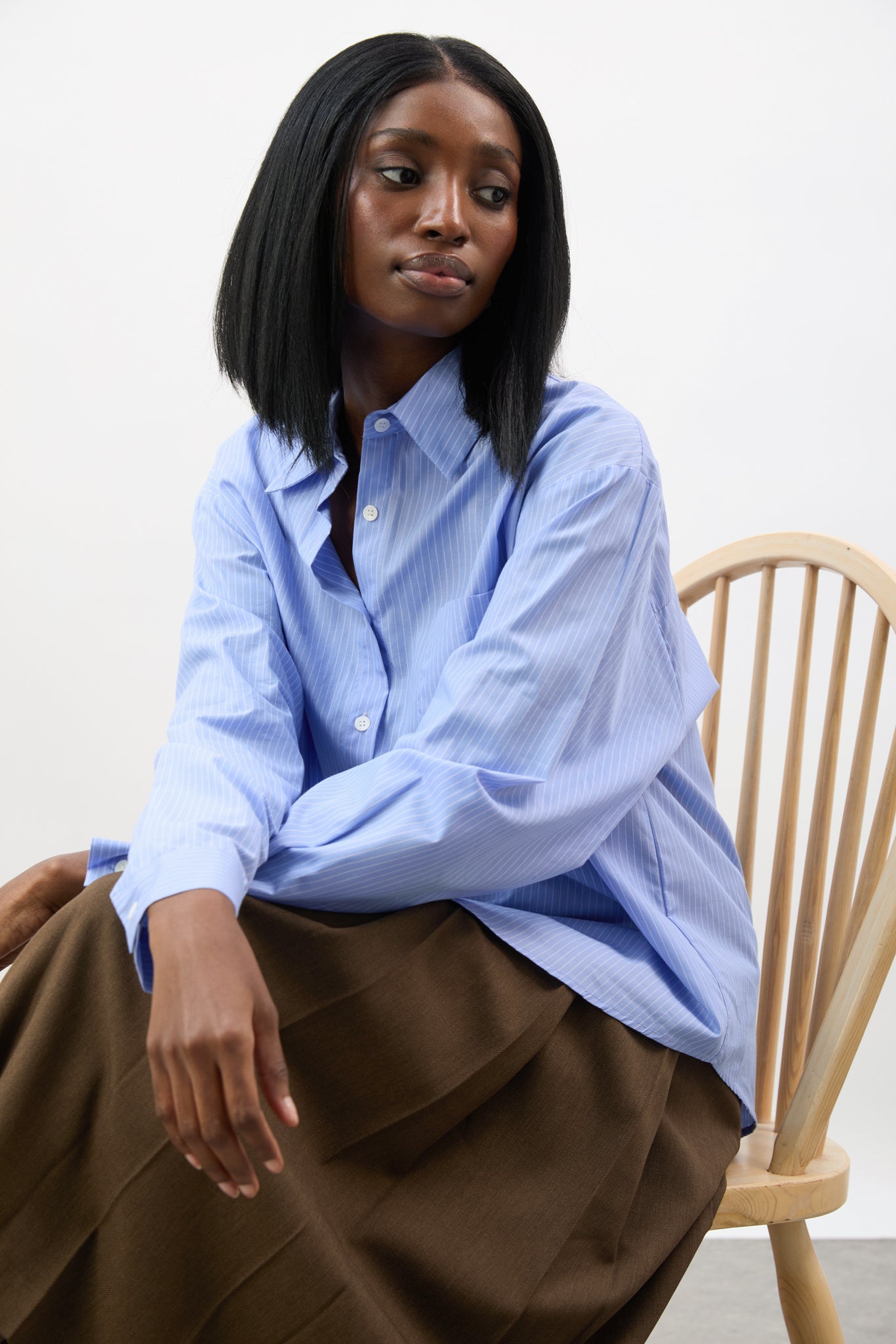 Blue and white pinstriped loose fit shirt_5