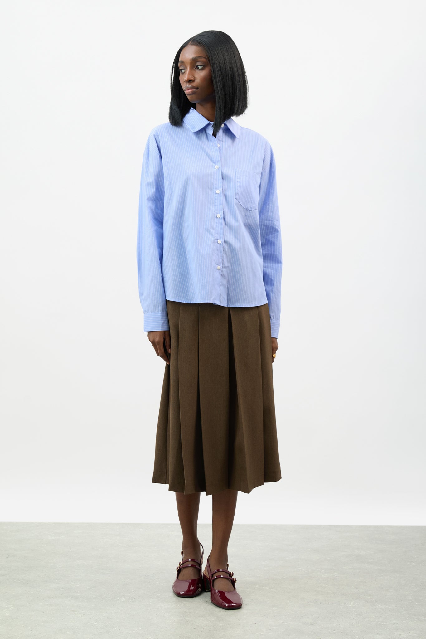 Blue and white pinstriped loose fit shirt_4