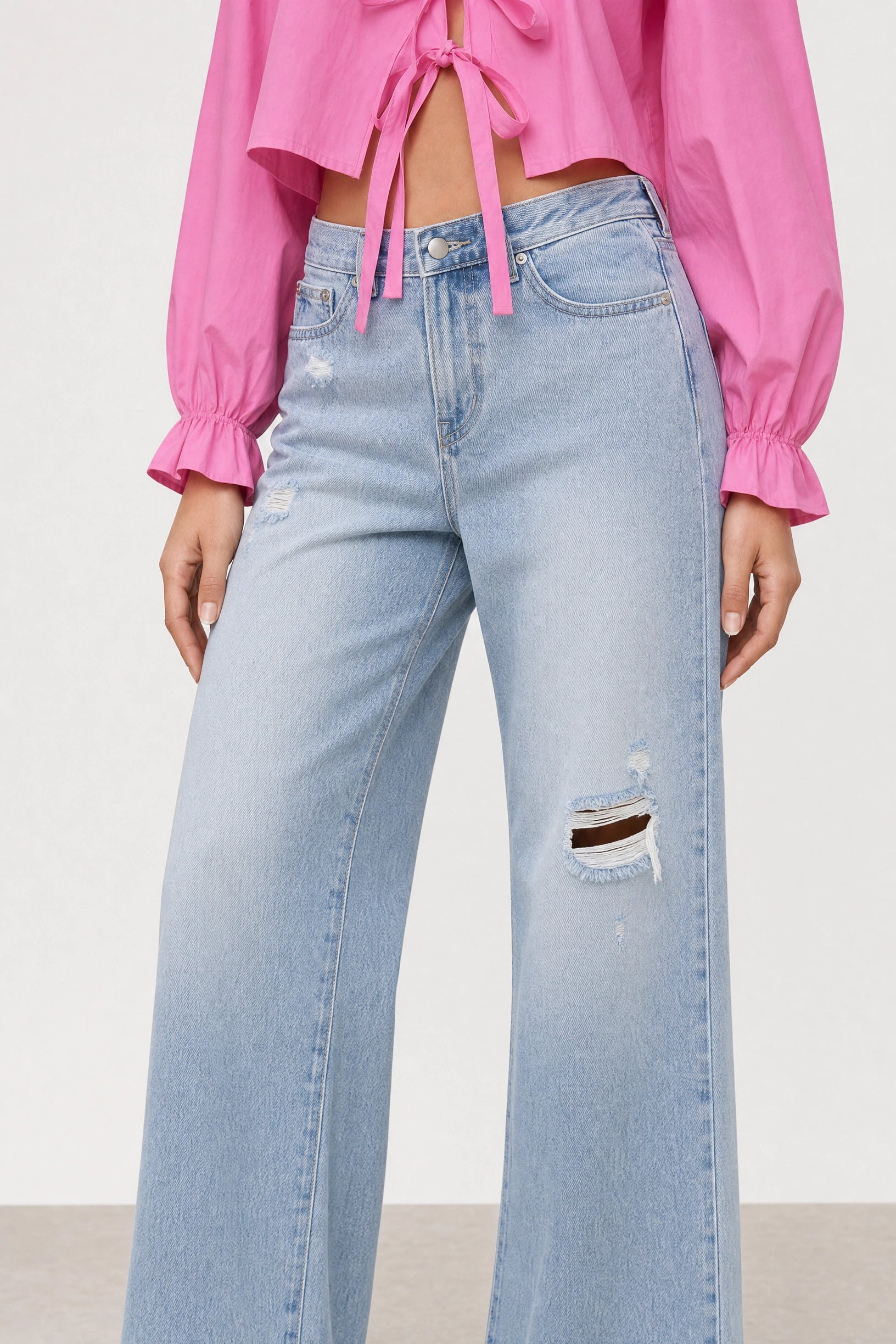 Blue light wash distressed detail jeans_3