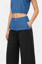 Blue denim and black jersey trousers_6