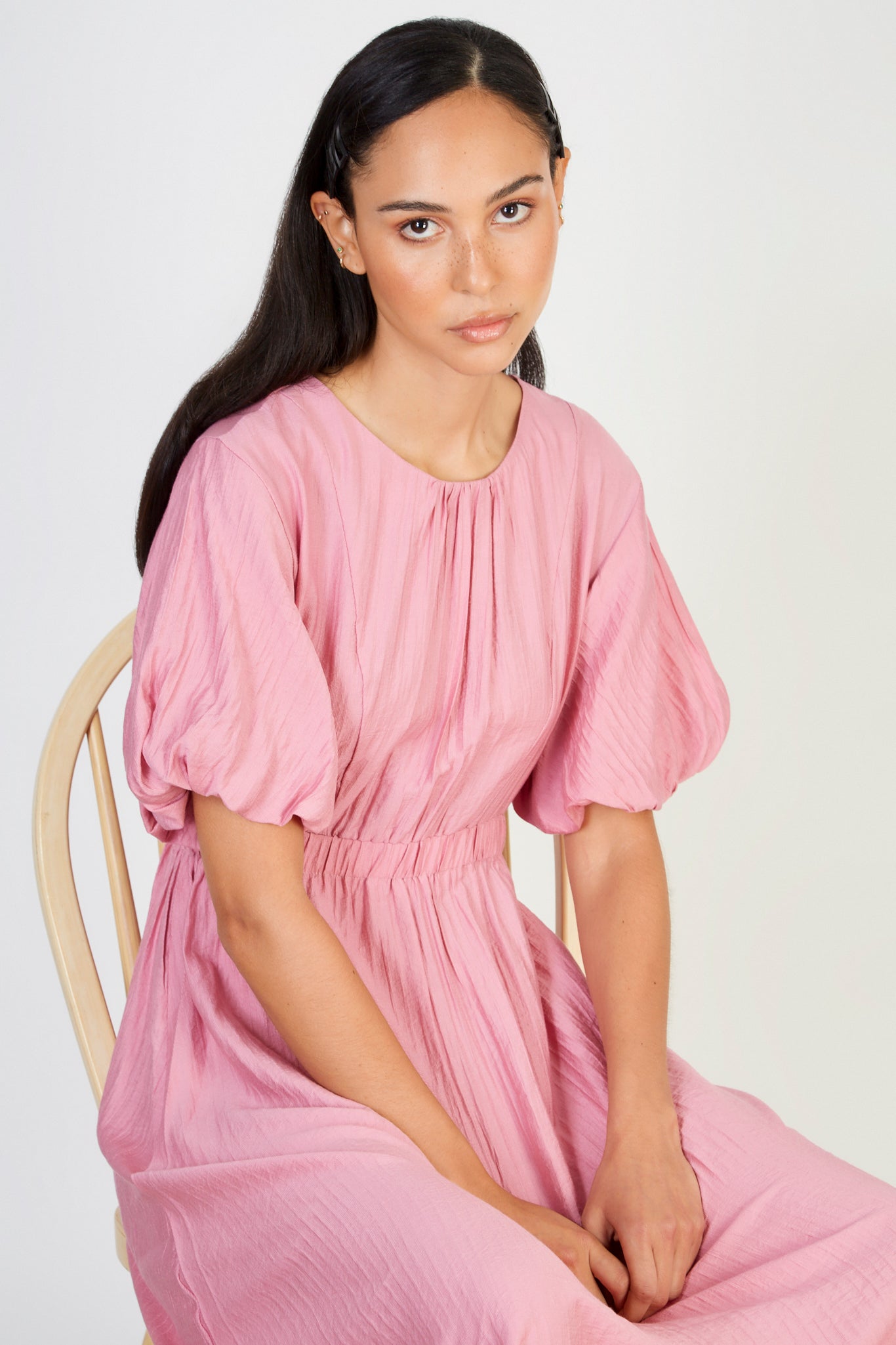 Bright pink puff sleeve dress