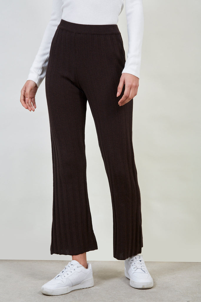 Brown thick ribbed knit trousers_1
