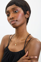 Gold opalescent sun charm necklace_4