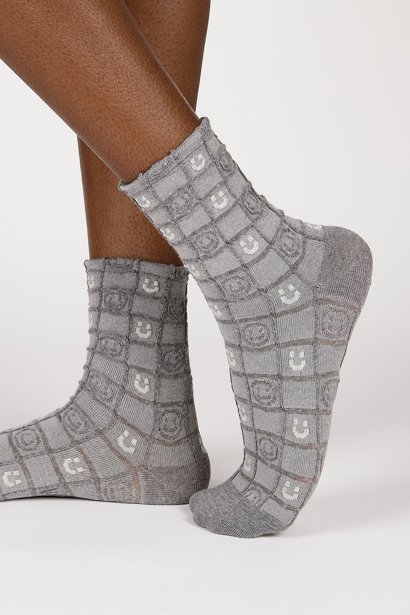 Grey and white checked smiley face socks_1