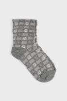 Grey and white checked smiley face socks_3