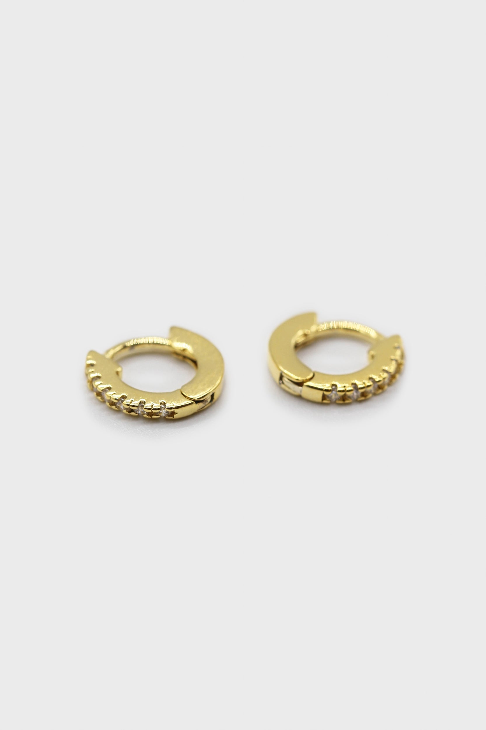 Gold rainbow pave huggie earrings - 6.5mm