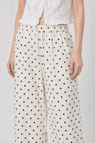 Ivory and black polka dot linen blend slouchy trousers_3