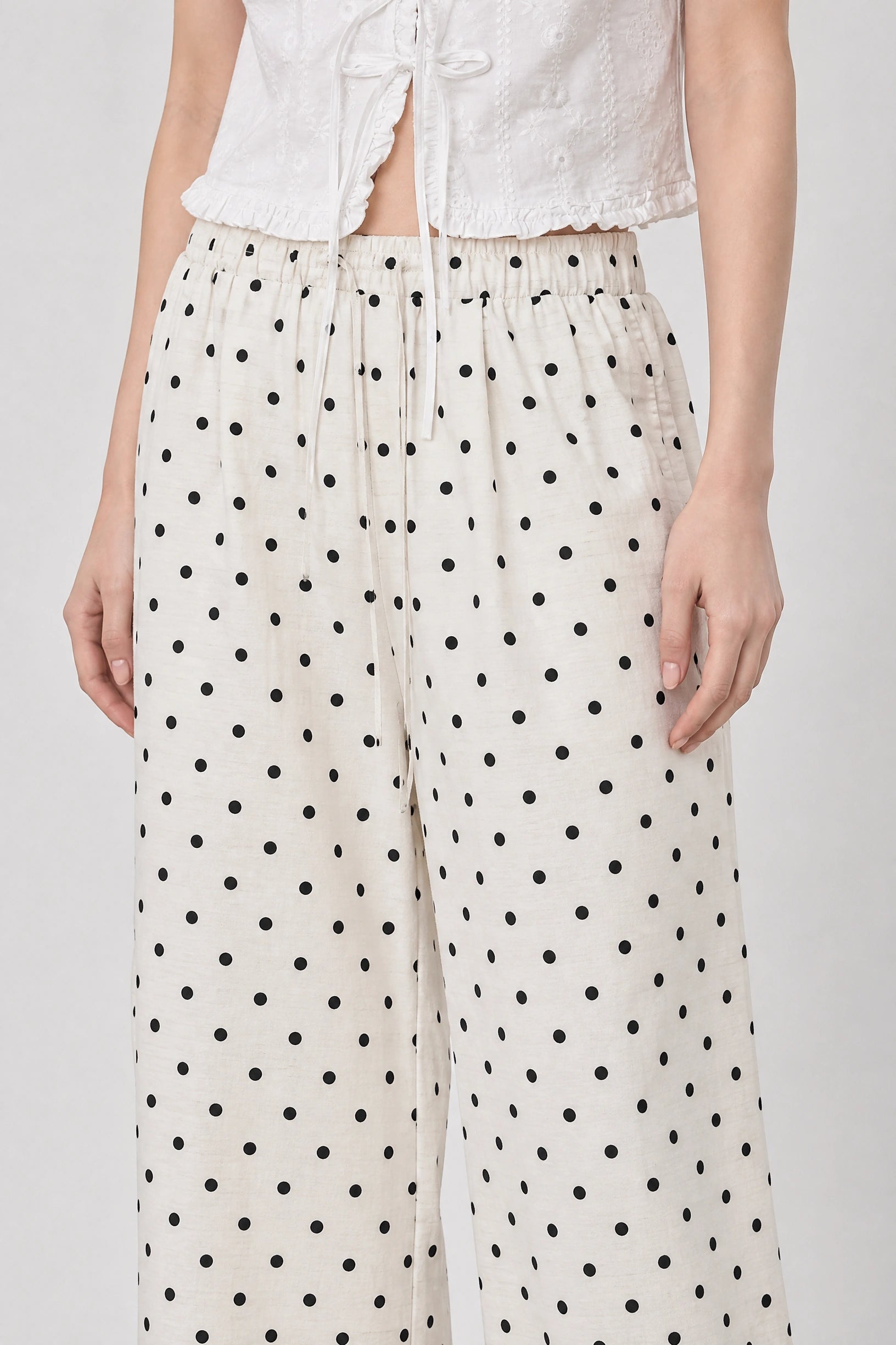 Ivory and black polka dot linen blend slouchy trousers_3