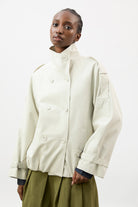 Ivory funnel neck cropped trench coat_1