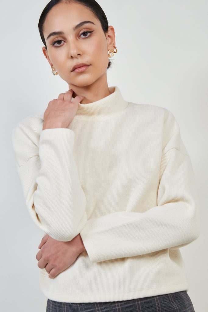 Ivory micro ribbed mock neck top_1