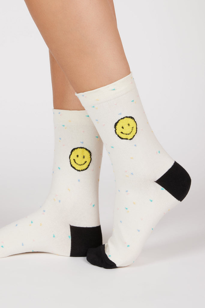 Ivory rainbow flecked smiley face socks_1