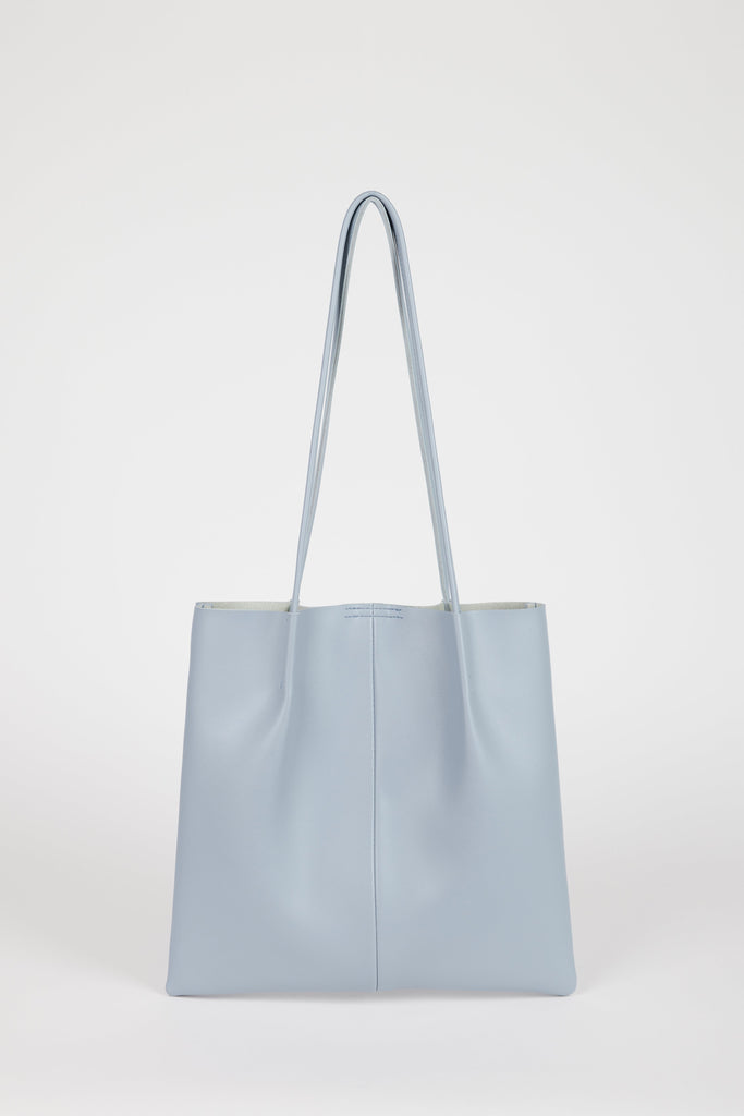 Light blue vegan leather pinched strap tote bag_1