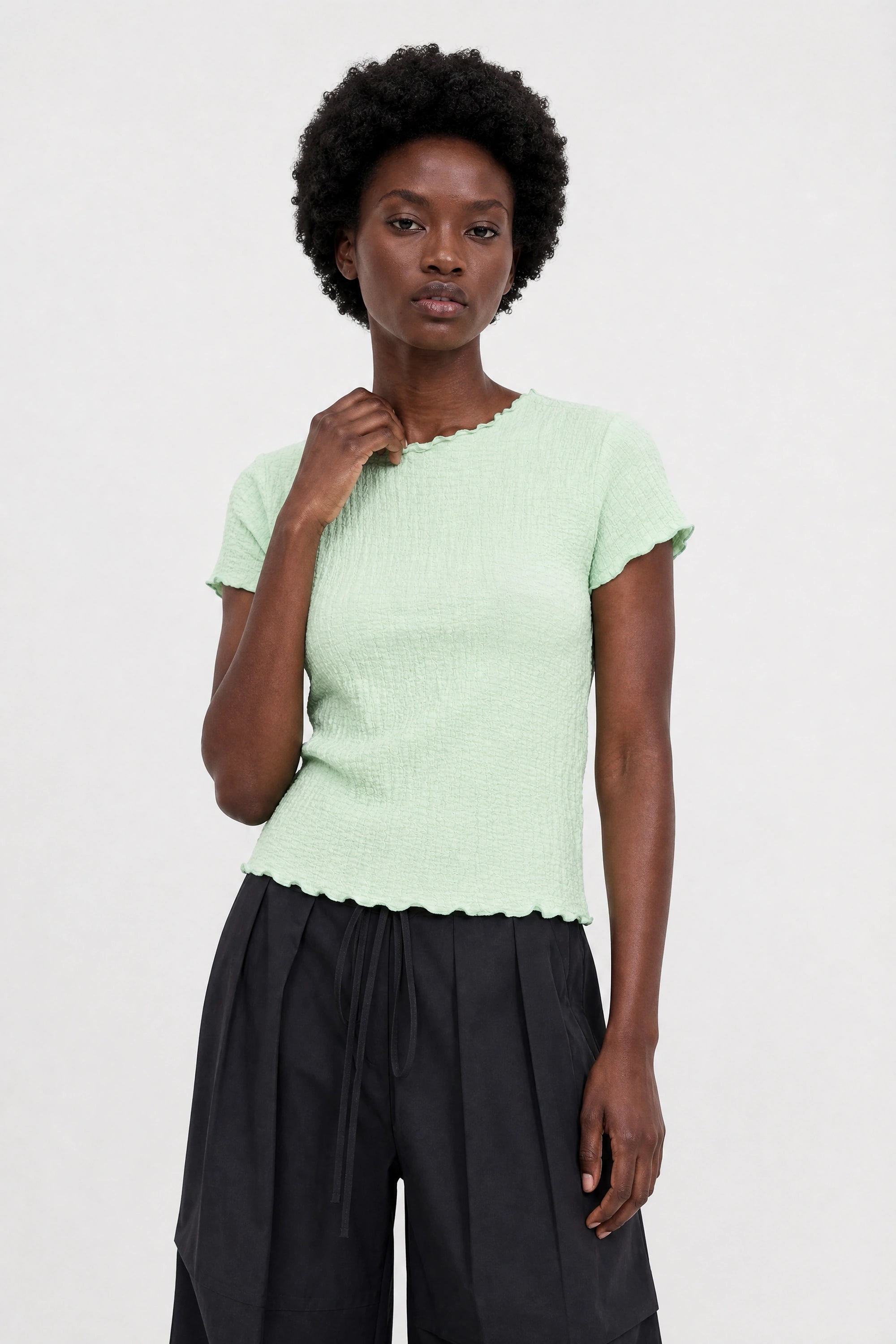 Mint green bubble texture mock neck short sleeve top_1