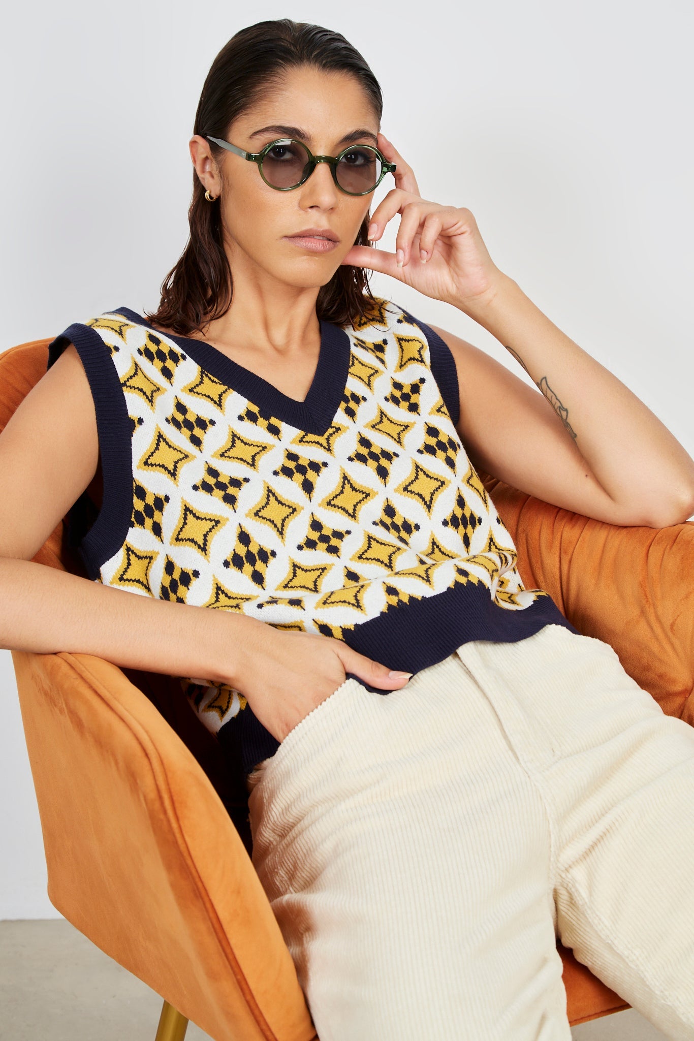 Mustard and navy intarsia graphic sweater vest_1