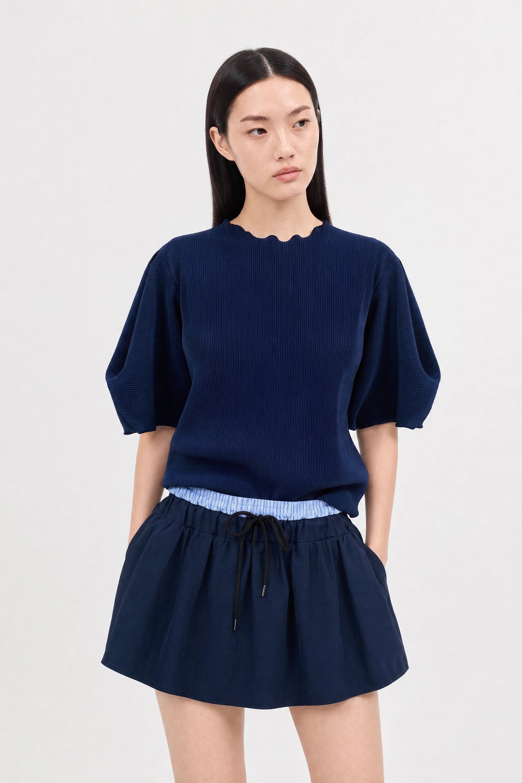 Navy blue ribbed mock neck blouson sleeve top_1
