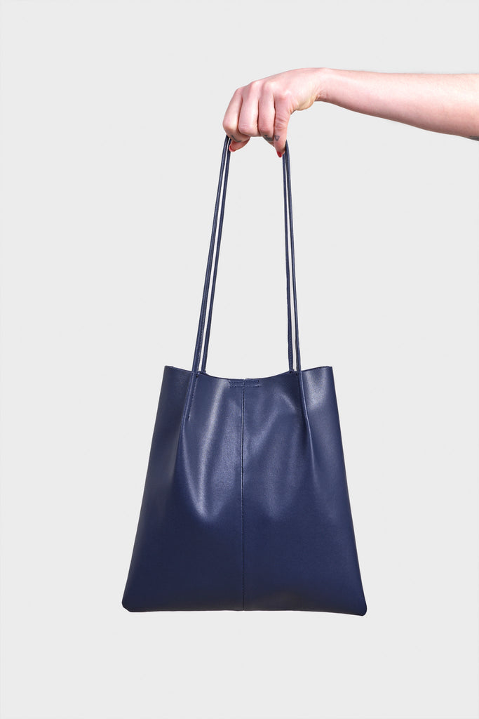 Navy blue vegan leather pinched strap tote bag_1