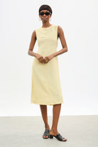 Pale yellow tie up peek back dress_2