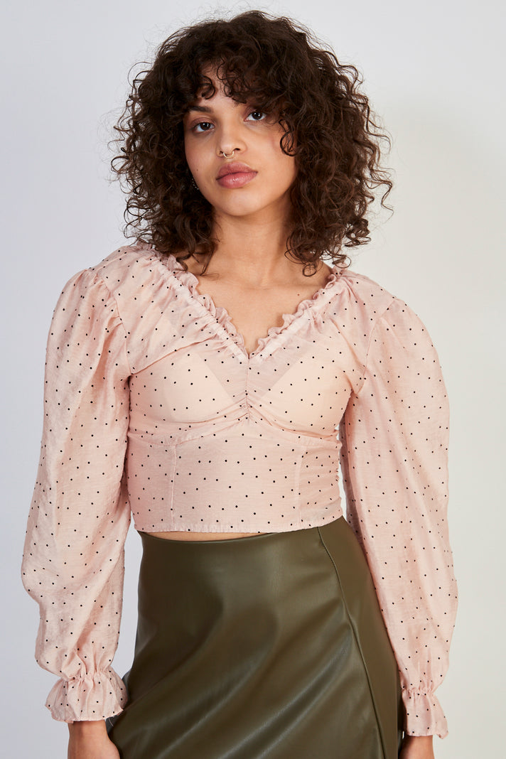 Pink and black polka dot blouse