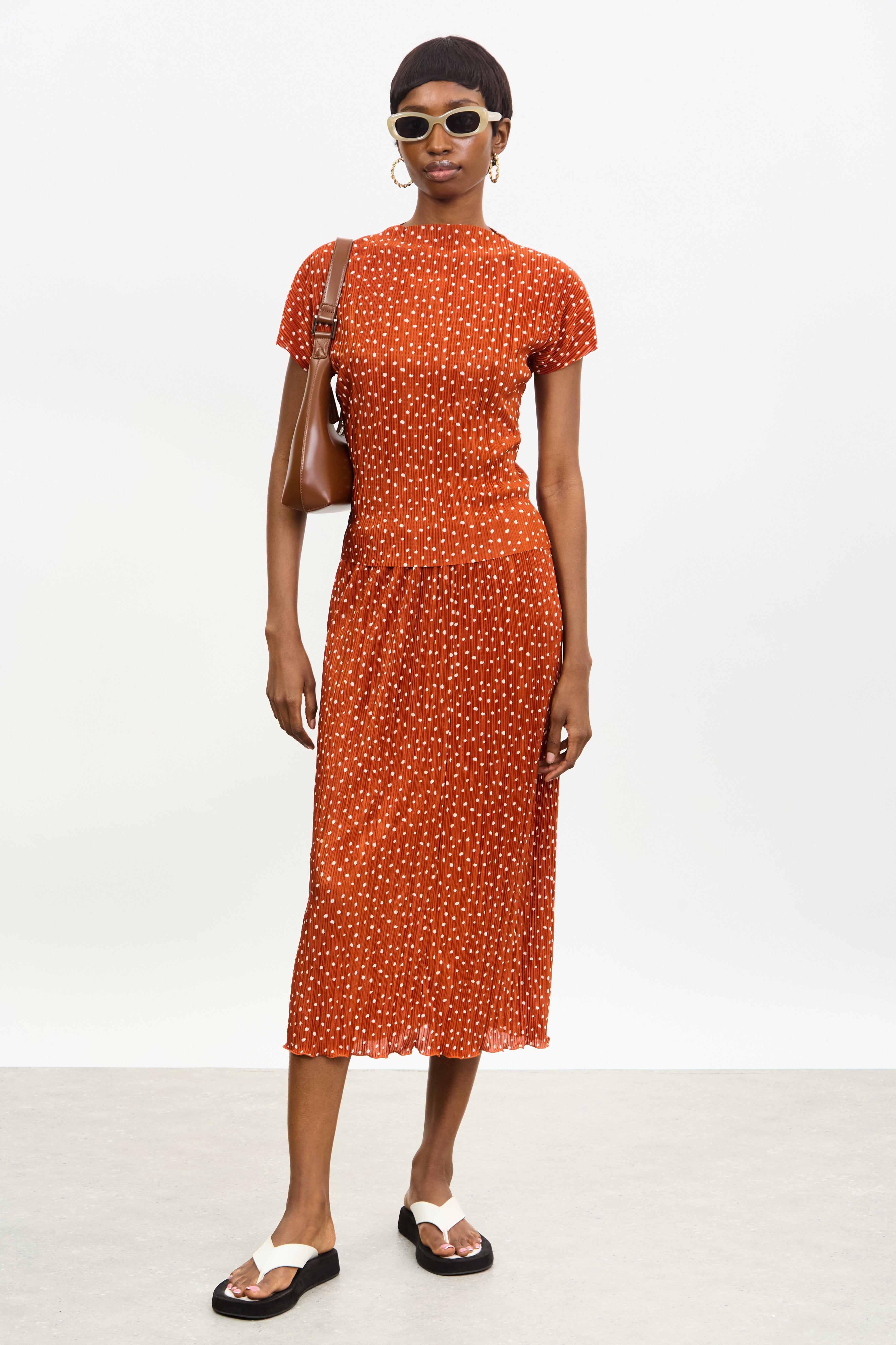 Rust orange and ivory polka dot ribbed short sleeved top
