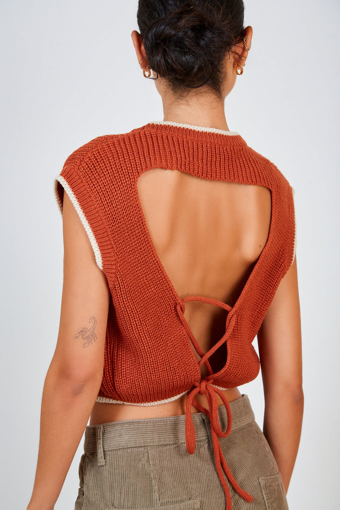 Rust brown and ivory trim open tie back sweater vest_1