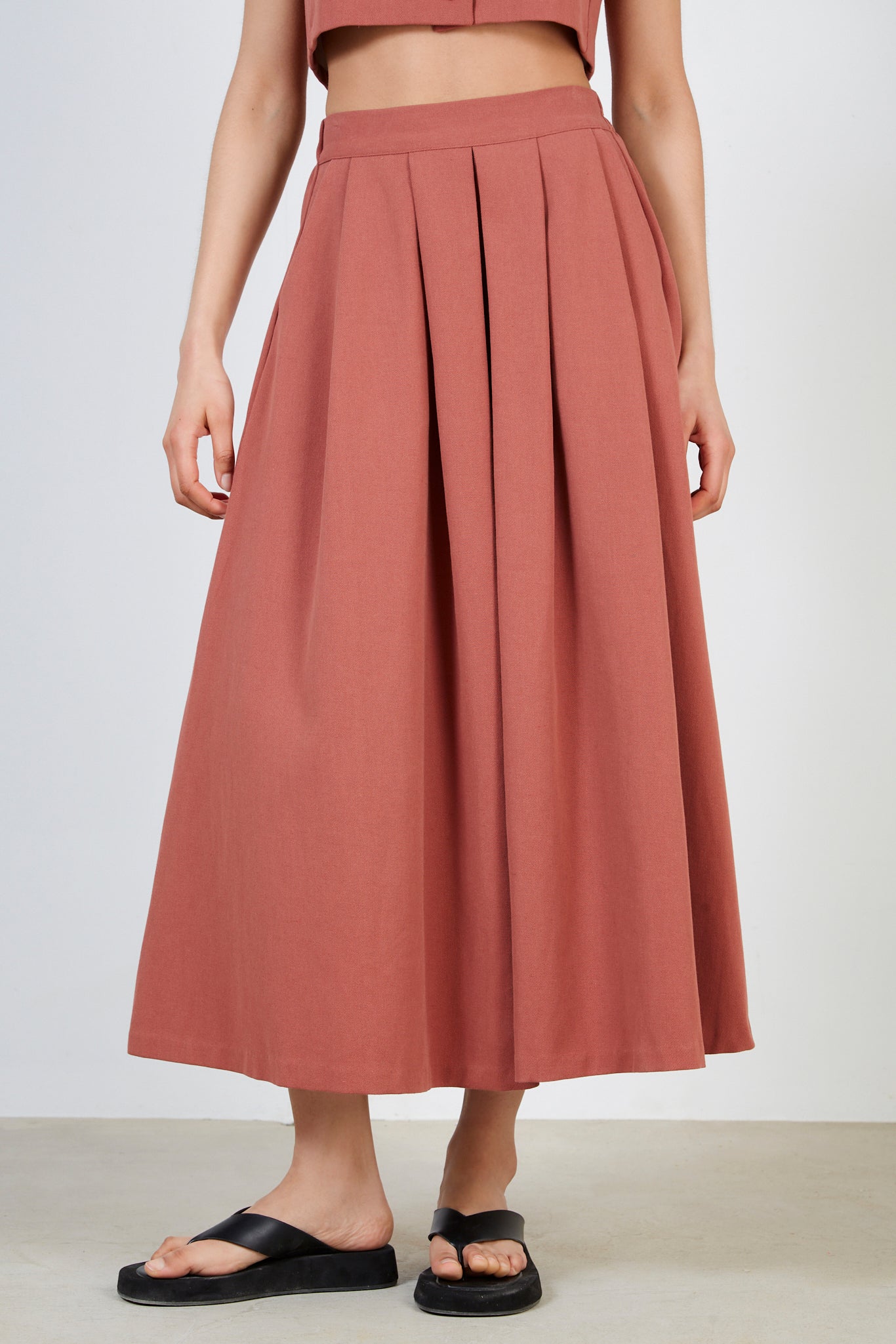 Rust red pleated skirt