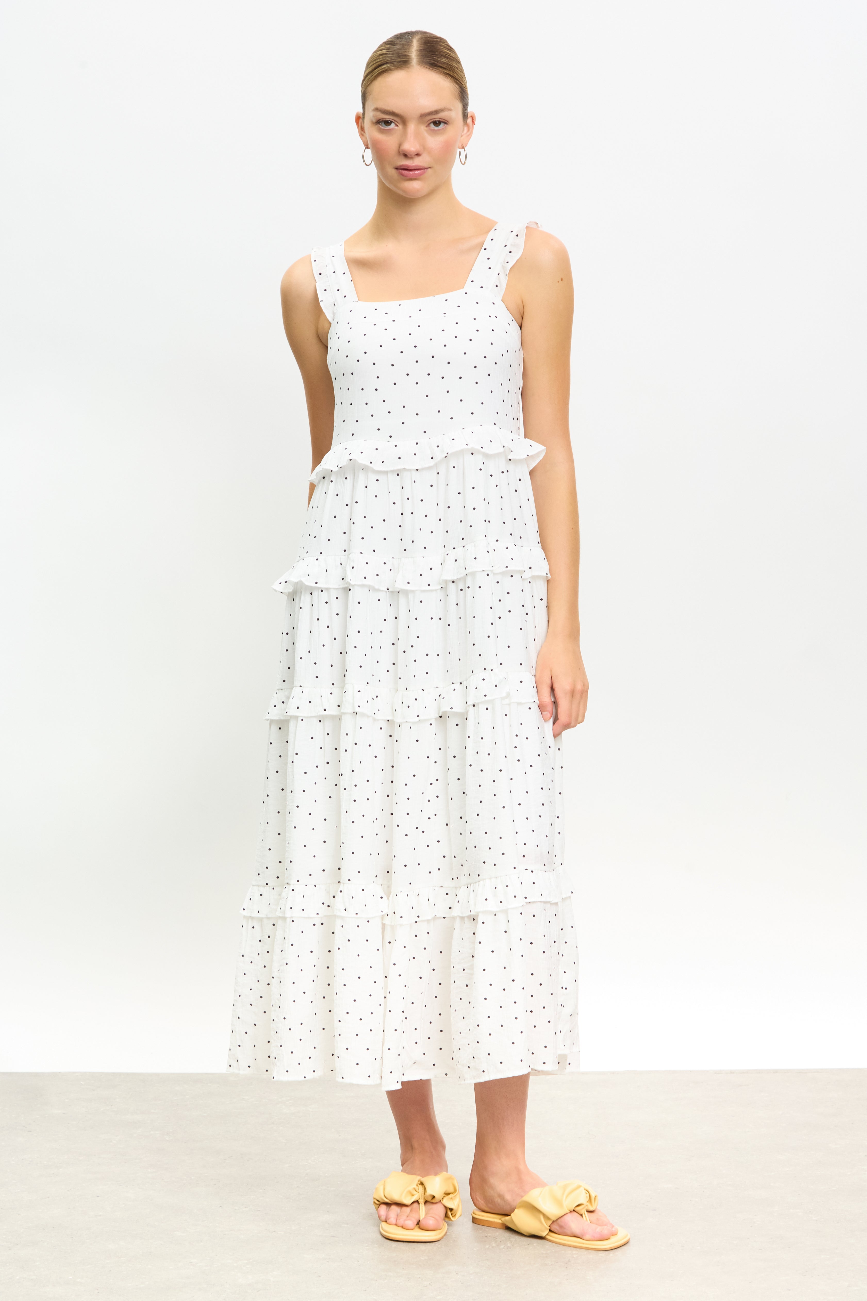 White and black polka dot ruffle trim tiered dress | Glassworks London