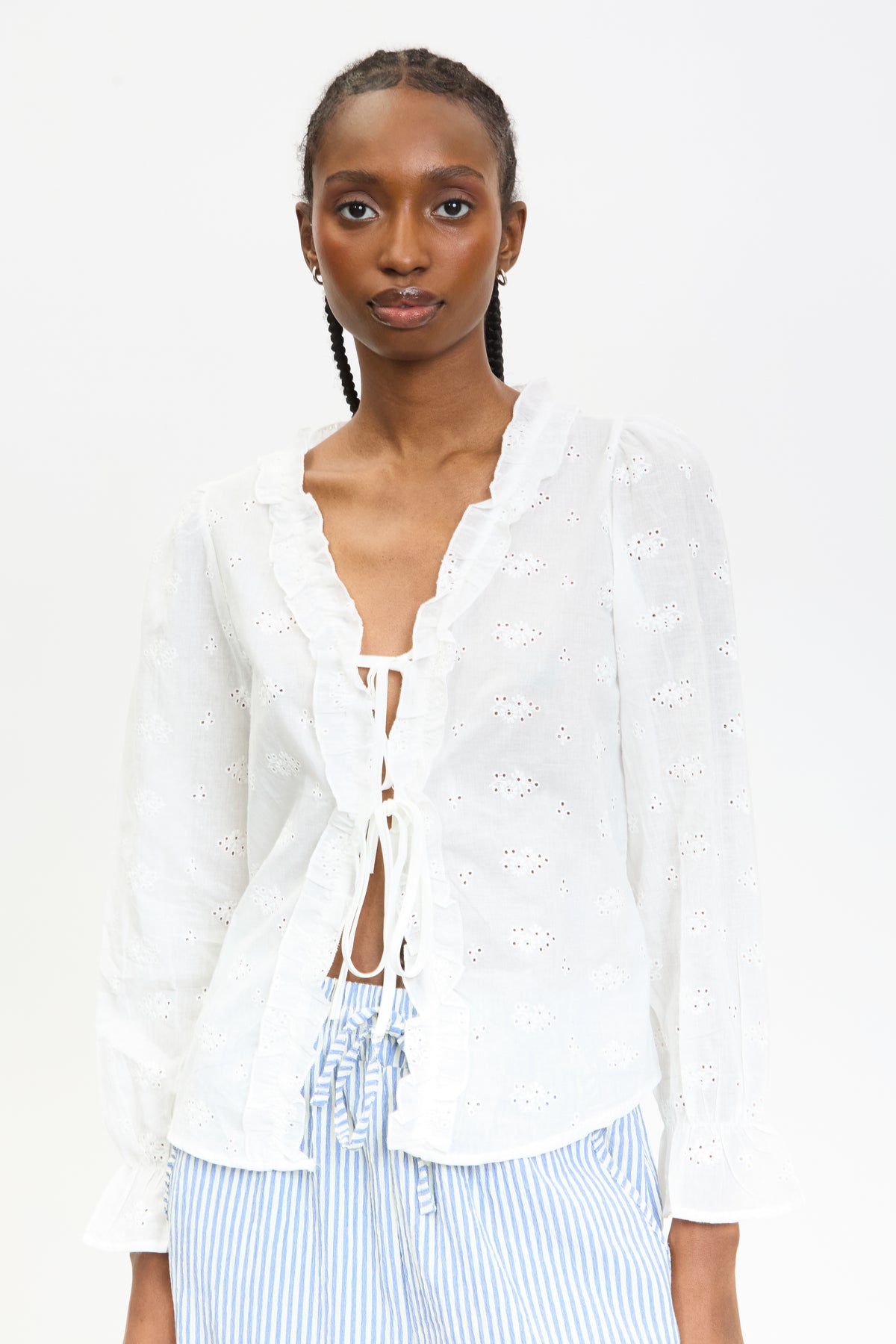 White embroidered frill trim tie front blouse | Glassworks London