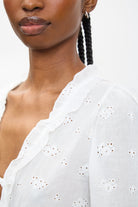 White embroidered frill trim tie front blouse_3