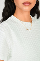 White herringbone textures short sleeved top_3